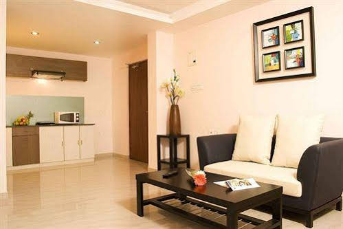 Capital O 5829 Gardeenia Comforts Suites