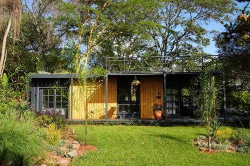 Pumbaa Farmhouse Cottages — 4-Star Luxury Hotel in Nairobi, Kenya
