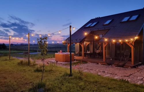 Osada Miłojeż całoroczne Domy Premium w Borach Tucholskich Jacuzzi pod gwiazdami pet-friendly hotel Gostycyn