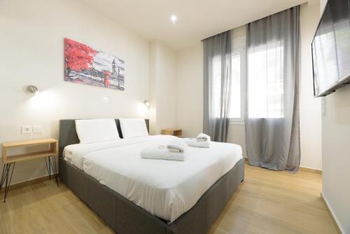 Chic 1 Bedroom Apartment with balcony by WeHost Athens — 4-Star Luxury Hotel in Athens, Greece