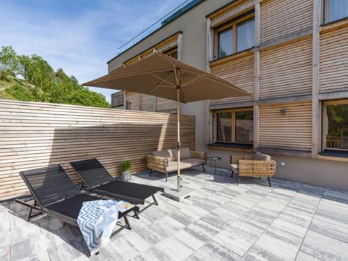 Apartment Hideaway Stylisch Ruhig Topausstattung Infrarotsauna Dachterrasse — 4-Star Luxury Hotel in Walchsee, Austria