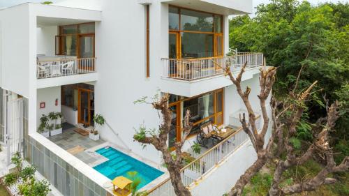 SaffronStays Villa Bougain 2BR hill view villa with plunge pool Veg BBQ birdwatching & serene garden sit outs — 4-Star Luxury Hotel in Udaipur, India