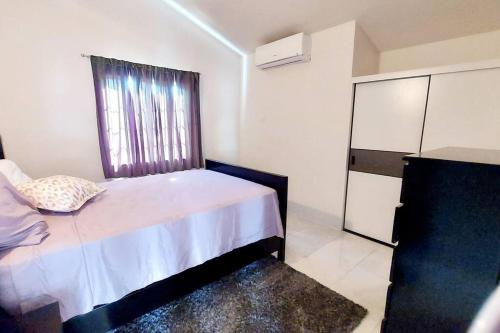 House of Bliss — 4-Star Luxury Hotel in Portmore, Jamaica
