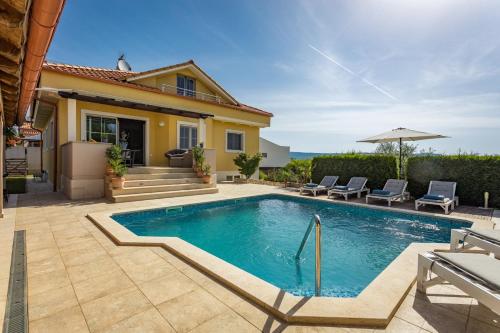 Villa Krase kids friendly for 10 persons in Rakalj with sauna fitness & playground — 4-Star Luxury Hotel in Marcana, Croatia
