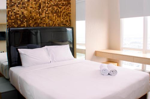 1BR Spacious Combine Unit at Vasanta Innopark Apartment By Travelio — 4-Star Luxury Hotel in Cikarang, Indonesia