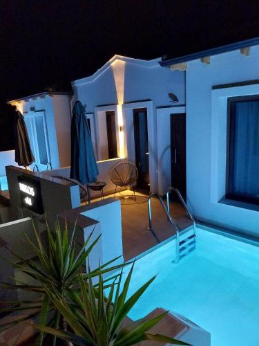 Nikos Vkl - carbon neutral hotel in Unknown City