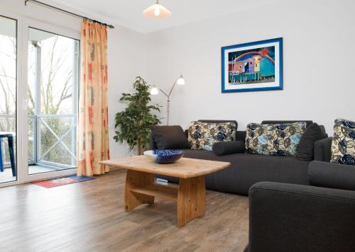 Residenz am Yachthafen Meeresleuchten — 4-Star Luxury Hotel in Kirchdorf, Germany
