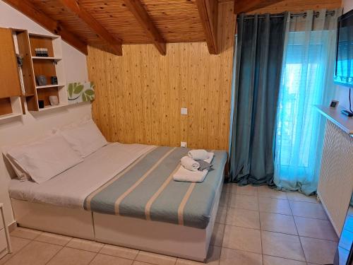 Attic — 4-Star Luxury Hotel in Nea Moudhania, Greece