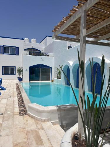 The Greek Village Milos By Seahorse in Unknown City, Jordan