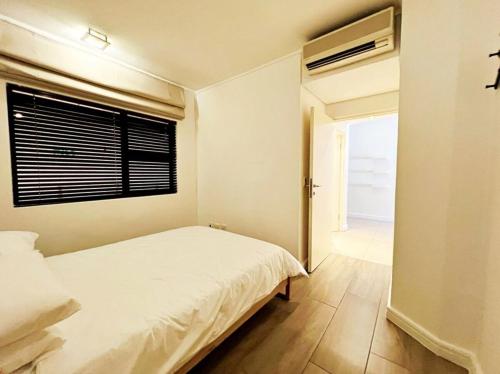 The Rockwell 1BR and OneFlow Yoga Club Access
