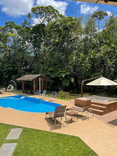 Refúgio do Brilhantte Belo sítio com piscina e spa in Itajai, Brasil