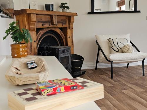 Fiáin Retreat luxury fire place sun room in Unknown City, Republic of Ireland