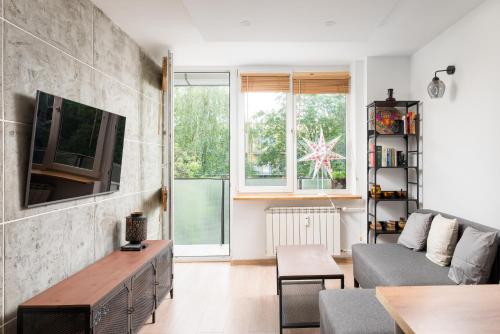 Afrykańska Urban Chic Apartment by BookingHost — 4-Star Luxury Hotel in Warsaw, Poland