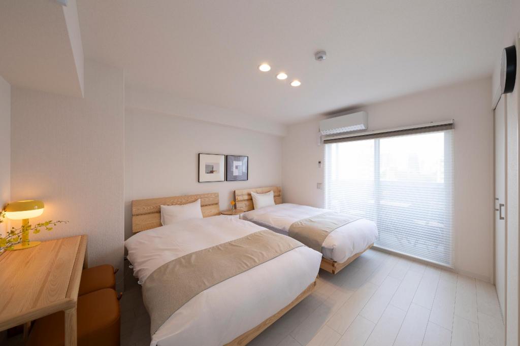 Shirakabanoyado Nipponbashi Twin Bed — 4-Star Luxury Hotel in Osaka, Japan