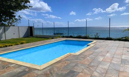 Baywatch Pieds dans l’eau avec piscine in Unknown City, Mauritius