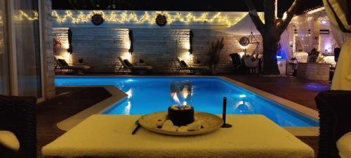 Villa Maria Lagonissi Private Villa upstairs with exclusive access to pool & outside areas — 4-Star Luxury Hotel in Kalyvia Thorikou, Greece