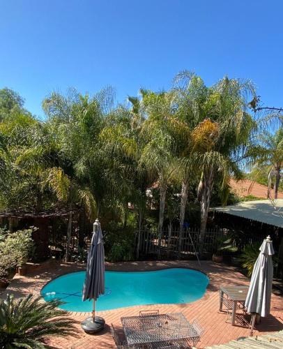 Olive Leaves Guest House — 4-Star Luxury Hotel in Gaborone, Botswana