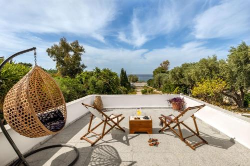 Mira Seaside Residence — 4-Star Luxury Hotel in Kalyvia Thorikou, Greece