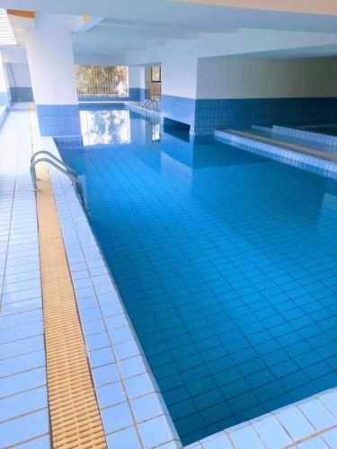 Executive living two bedroom apartment with heated swimming pool and well equipped gym with amazing city scenic views