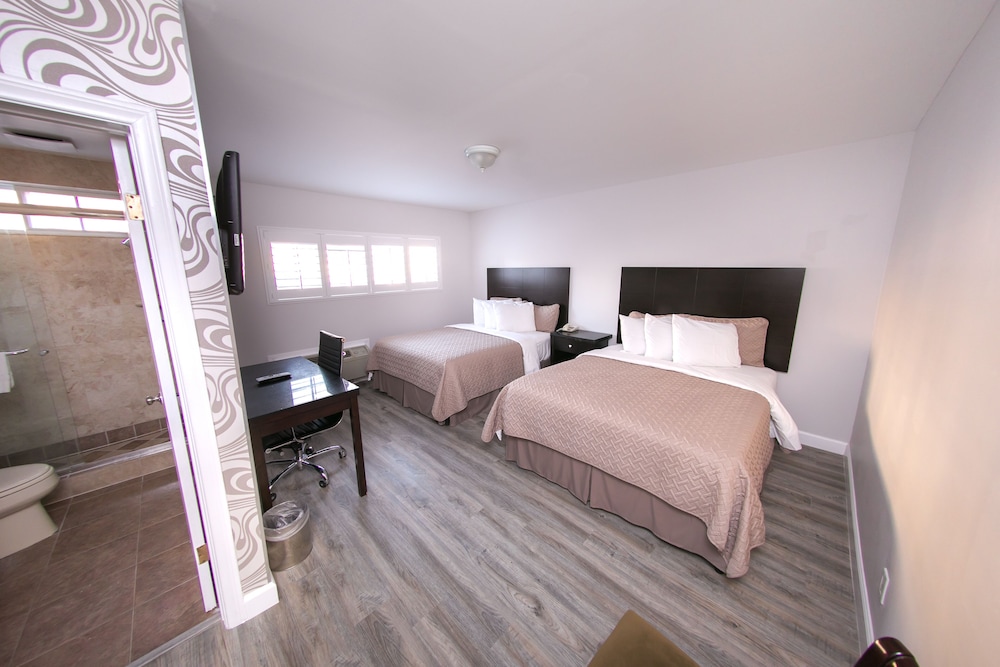 Metropolitan Inn & Suites - photo 14