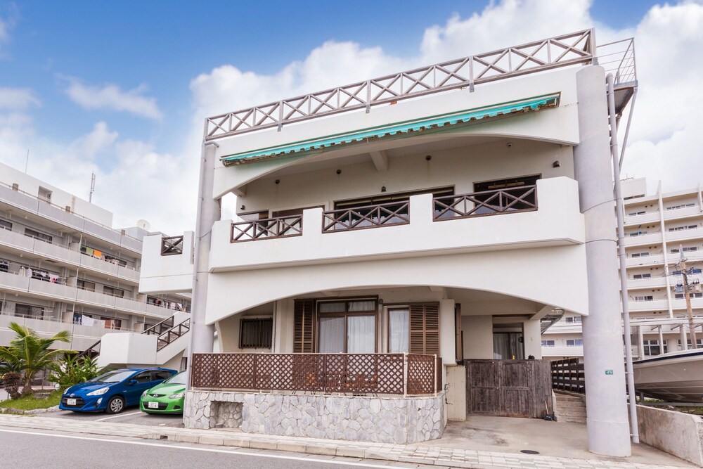 Kariyushi Condominium Resort Sea Side House in Nago, Japan