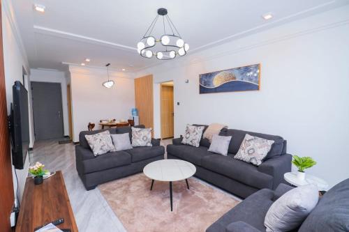 Modern Retreat Apartment With Swimming Fully Equipped Gym Private Parking Space And A Relaxing Rooftop With Amazing City Views