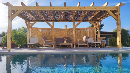 Stonehouse Olivelia Afrathias Beach — 4-Star Luxury Hotel in Tympaki, Greece