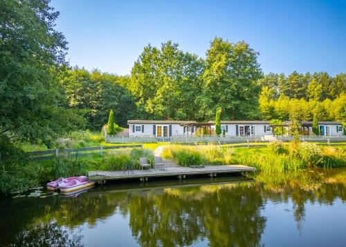Domki drewniane na Spławiu nad morzem in Darlowo, Poland