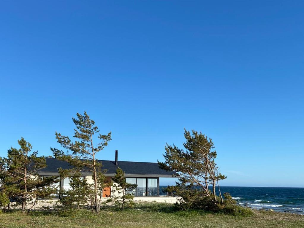 Seaside Rendezvous - carbon neutral hotel in Unknown City