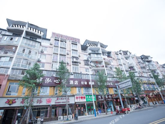 Yilong Jinhong Xinyue Hotel — carbon neutral stay, Yilong