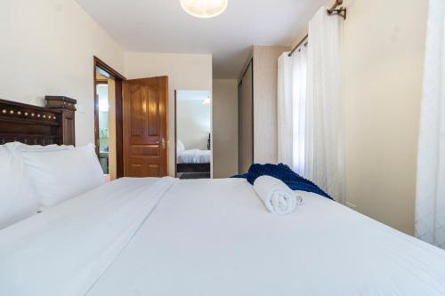 Serenity Retreat 2 Bed Apartment with Pool & Gym
