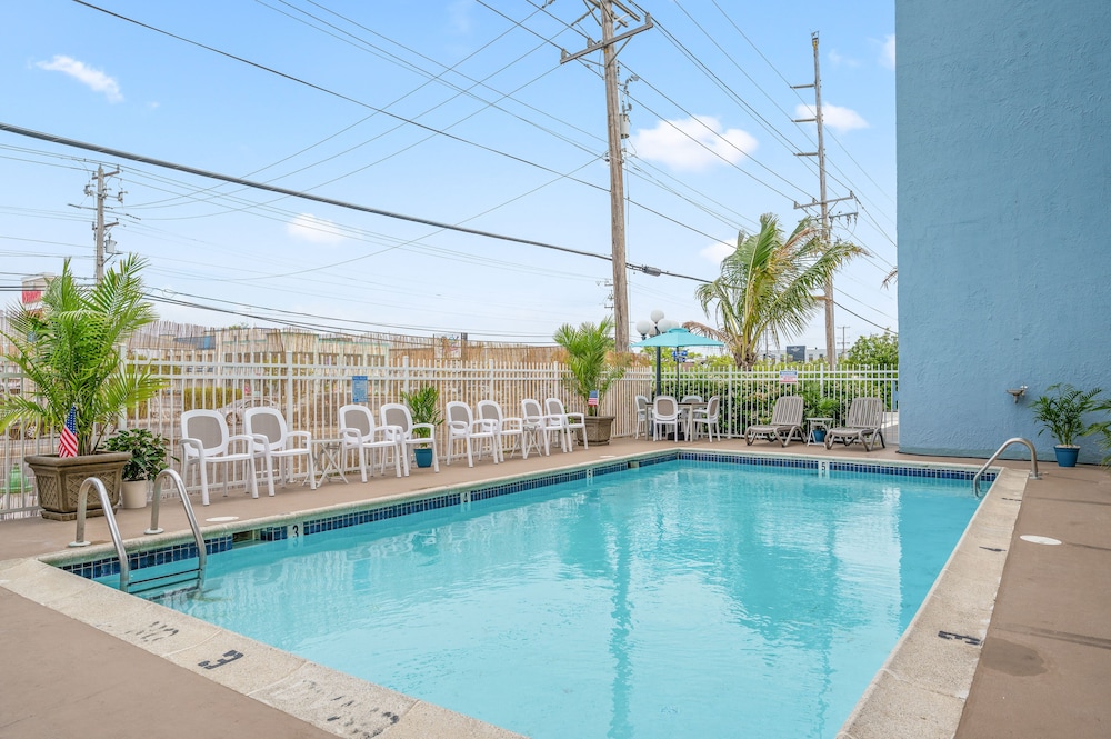Coastal Palms Inn & Suites - photo 22