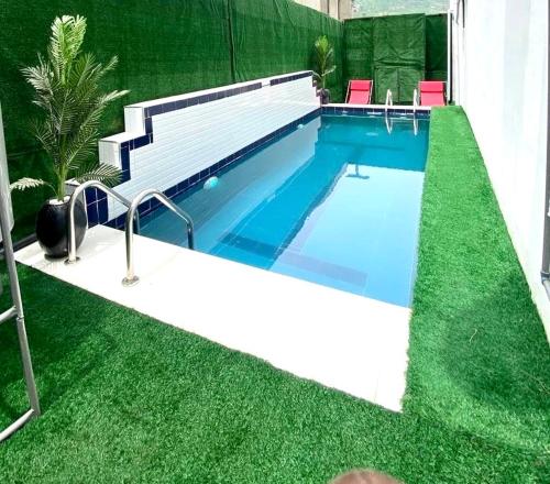 Morak homes Smart luxury 4 bed with private swimming pool PS5 snooker mini gym in reserved secured estate — 5-Star Luxury Hotel in Abuja, Nigeria