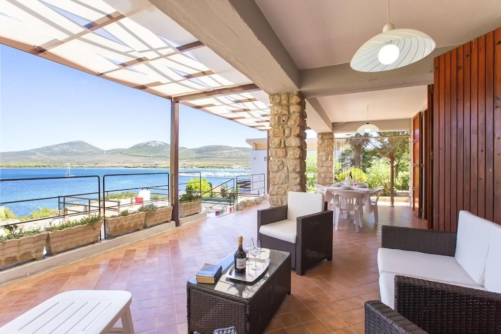 ClickSardegna Villa Flavia with seafront terrace in the Porto Conte Nature Park — 4-Star Luxury Hotel in Alghero, Italy