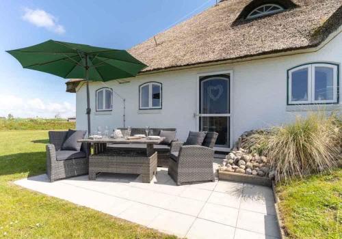 Friesenhof Dreilanden Friesenhof App 4 Seesternchen — 4-Star Luxury Hotel in Sankt Peter-Ording, Germany