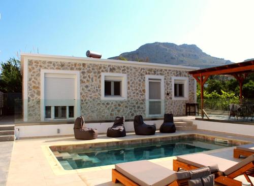 Casa Nikolou Stegna — 4-Star Luxury Hotel in Archangelos, Greece
