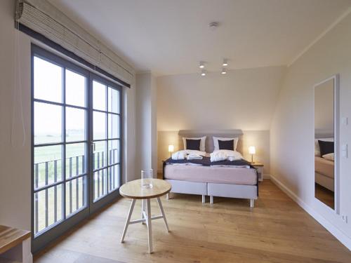 Reetland am Meer Premium Reetdachvilla mit 2 Schlafzimmern Sauna und Kamin E22 — Dranske — photo 4