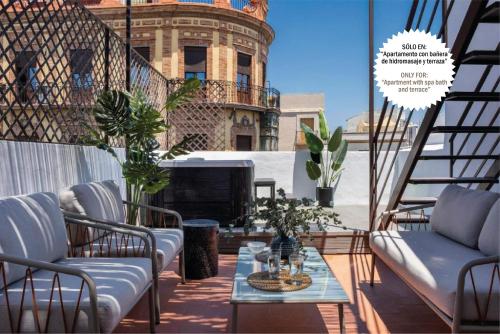 Suites Maestranza Puerta del Arenal by Magno Apartments — 4-Star Luxury Hotel in Sevilla, Spain