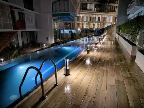 Encanto Cayala Acogedor y Moderno apartamento en Cayala con Aire Acondicionado — 4-Star Luxury Hotel in Guatemala City, Guatemala