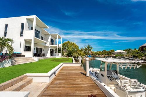 Waterfront Escape Poolside Fun BBQ Feasts in Unknown City, Turks and Caicos Islands