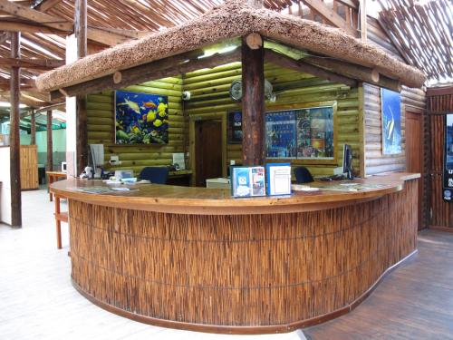 Coral Divers - carbon neutral hotel in Unknown City