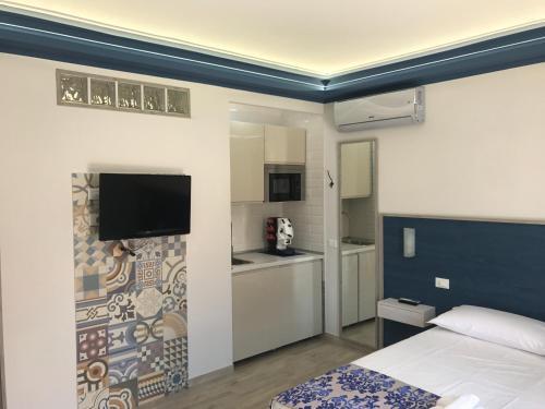 Elisir Suite Rooms — 4-Star Luxury Hotel in San Vito Lo Capo, Italy