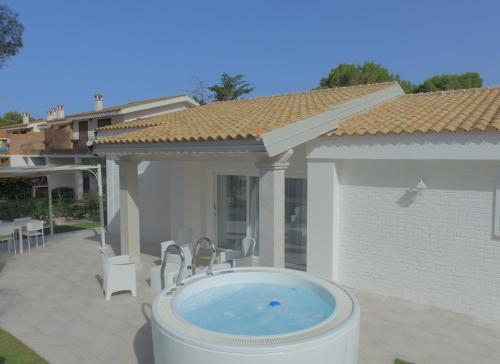 Ikebana Villas Porto Pino Beach — 4-Star Luxury Hotel in Sant'anna Arresi, Italy