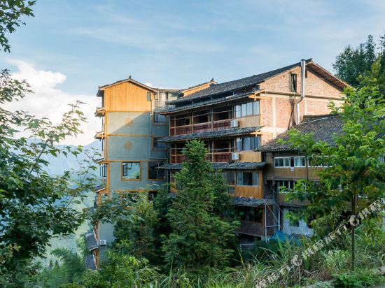 Jiulong Inn - carbon neutral hotel in Longsheng