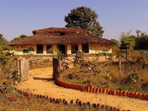 Infinity Resort Kanha - carbon neutral hotel in Baihar