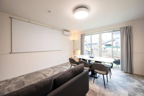 Amp Flat Hontosu - carbon neutral hotel in Unknown City
