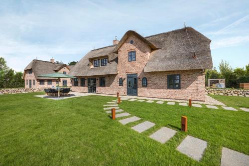 Koptainshüs Süd - carbon neutral hotel in Westerland