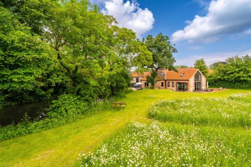 Waterside Barn - carbon neutral hotel in Unknown City