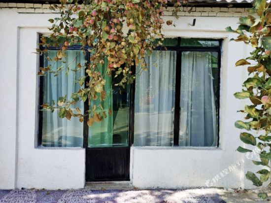 Xingxi Inn - carbon neutral hotel in Yining