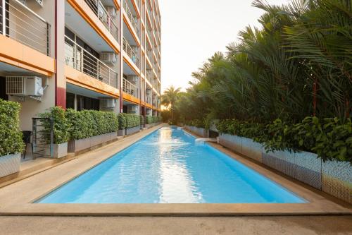 NaiHarn Pearl condo by Holy Cow 1 BR courtyard view — 4-Star Luxury Hotel in Rawai, Thailand